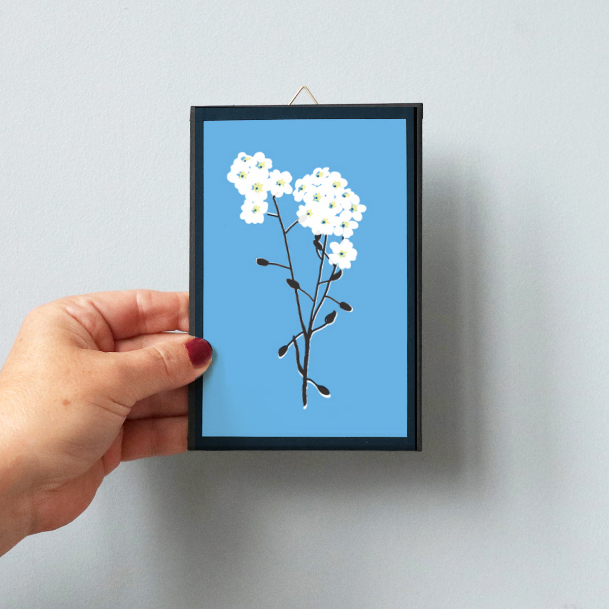 Blomst på blå baggrund